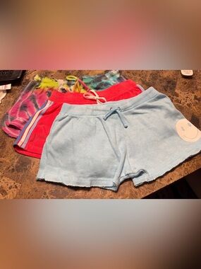 3 pairs of drawstring designer shorts. 12/14